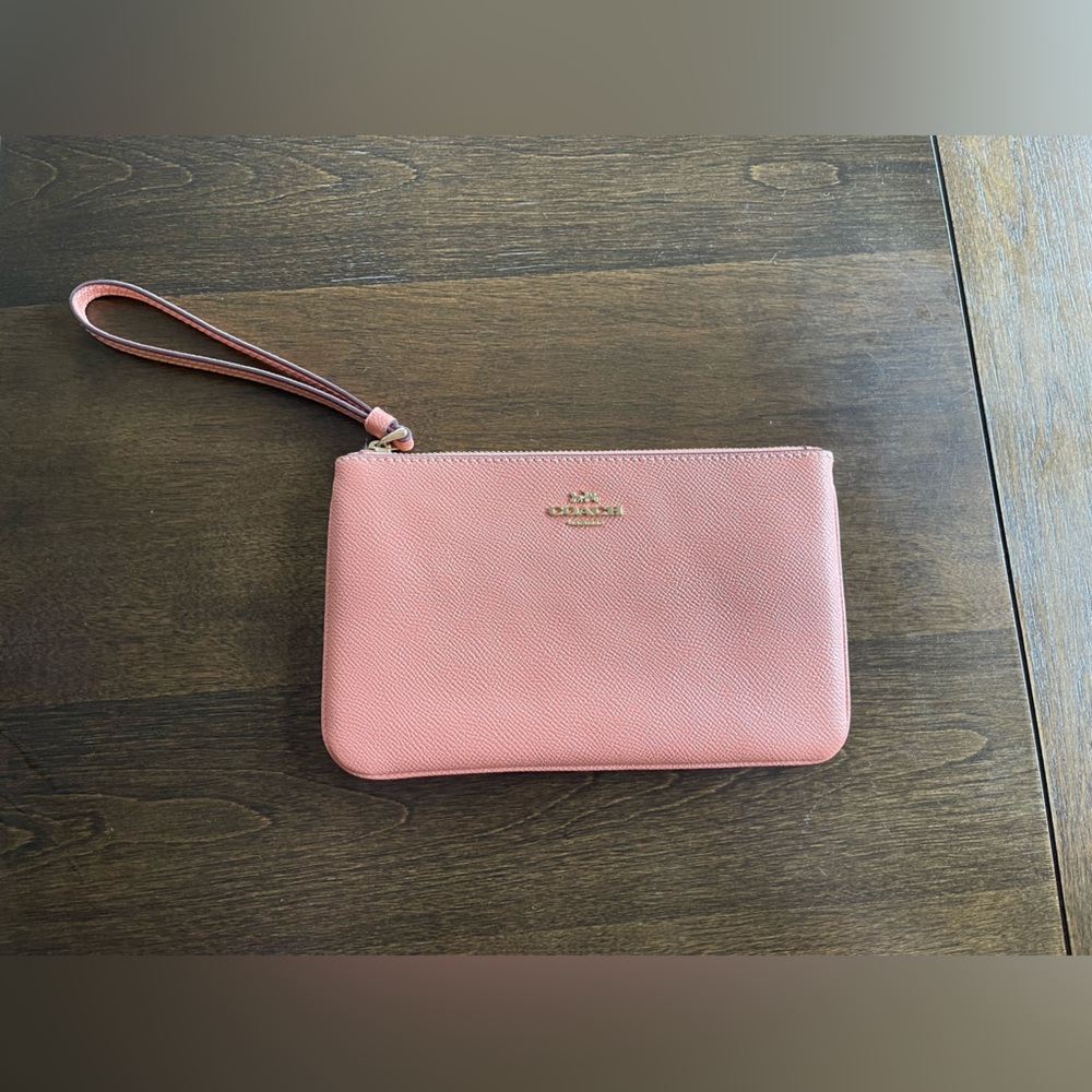 Light pink Coach Wristlet